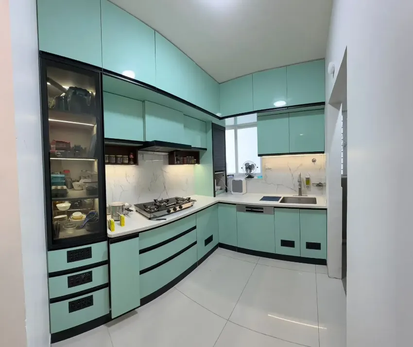 Teal kitchen with integrated storage completed by Trifold, Chennai