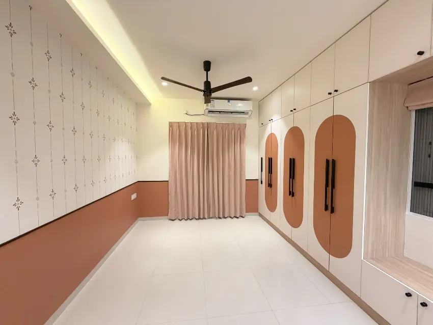Soft-toned bedroom with curved details completed by Trifold, Chennai