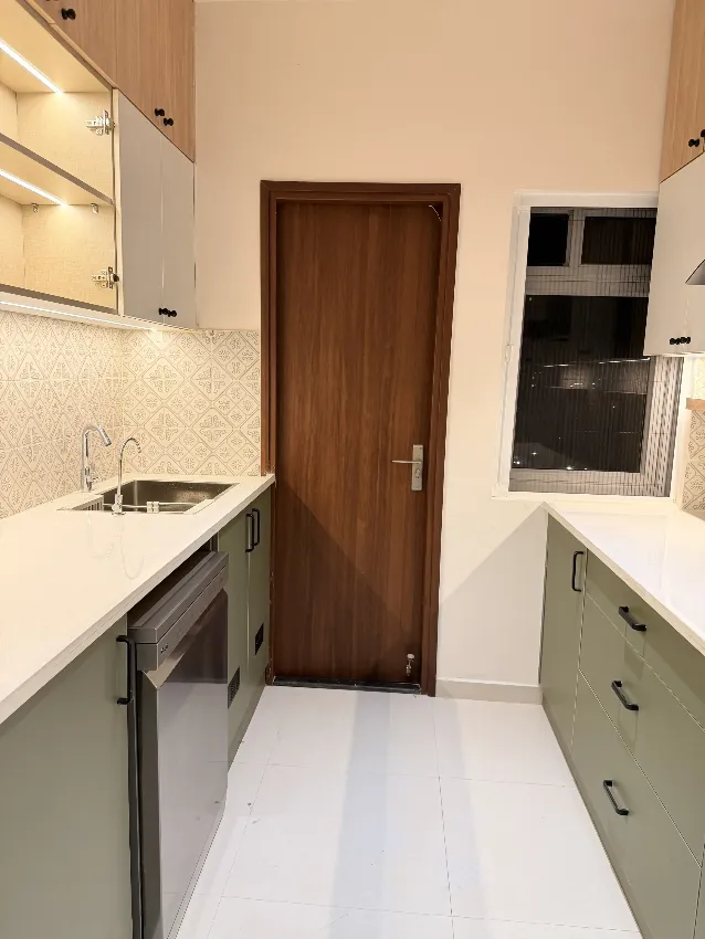 L-shaped kitchen with display shelving completed by Trifold, Chennai