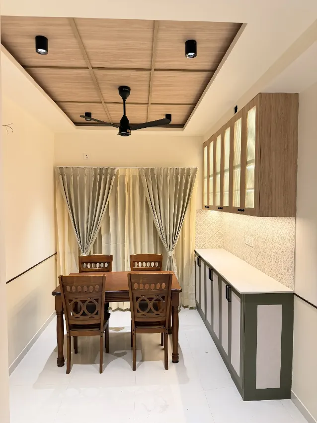 Dining space with custom display unit completed by Trifold, Chennai