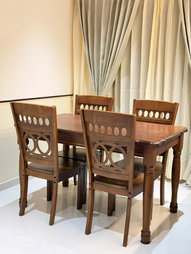 Warm timber dining setting completed by Trifold, Chennai
