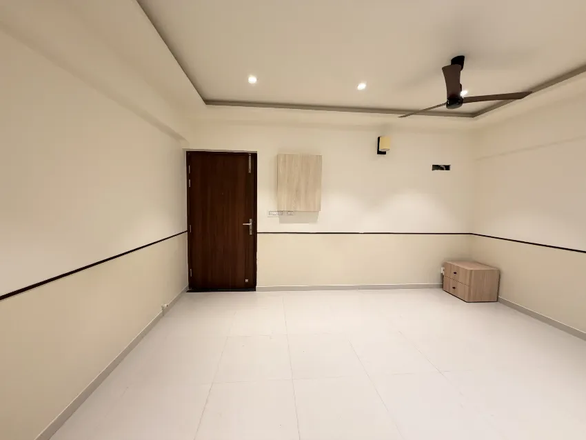 Minimal living room storage wall completed by Trifold, Chennai