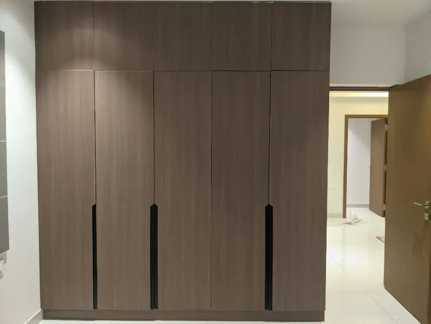 Tall kitchen storage and doorway detail completed by Trifold, Chennai